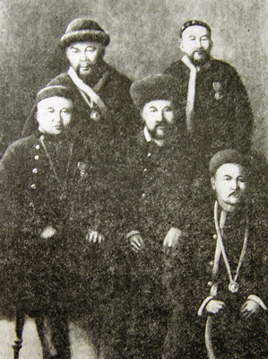 Portrait of Musa Chormanov in center Photograph by Kessler.